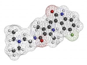 Sunitinib cancer drug molecule. Atoms are represented as spheres with conventional color coding: hydrogen (white), carbon (grey), oxygen (red), nitrogen (blue), fluorine (light green).