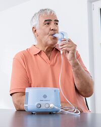Pari_COMPACT2_model_home_kitchen_table_old_man_usage_inhalation_22251