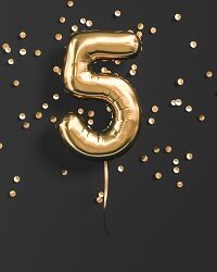 Five year birthday. Number 5 flying foil balloon