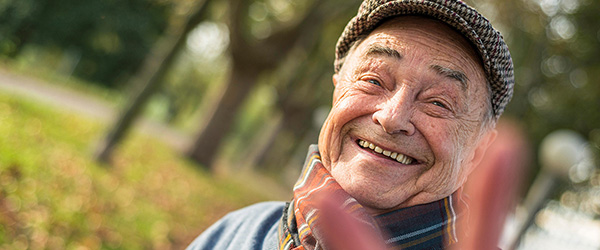 senior_man_doing_victory_sign_600x250