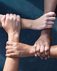 Multiracial people with black, latin, caucasian and asian hands