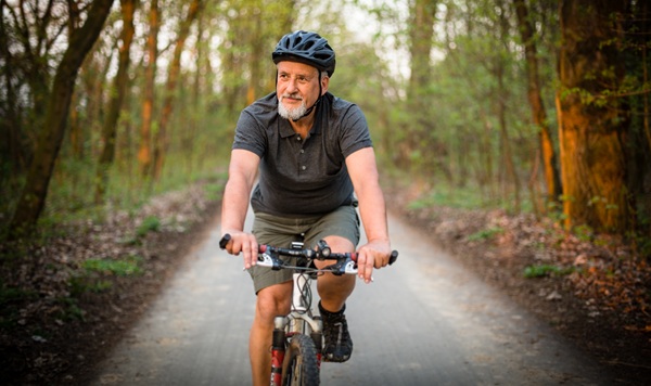 Senior man on his mountain bike outdoors