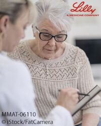 Doctor Reviewing Test Results with a Senior